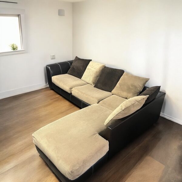 Rooms To Go Black/Beige Sectional