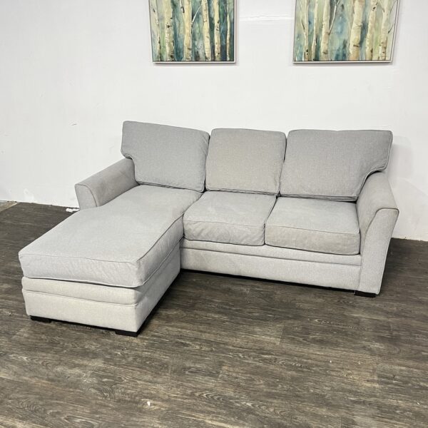 Ashley Furniture Gray Reversible Chaise Sectional - Image 2